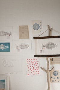 a room with a lot of pictures on the wall